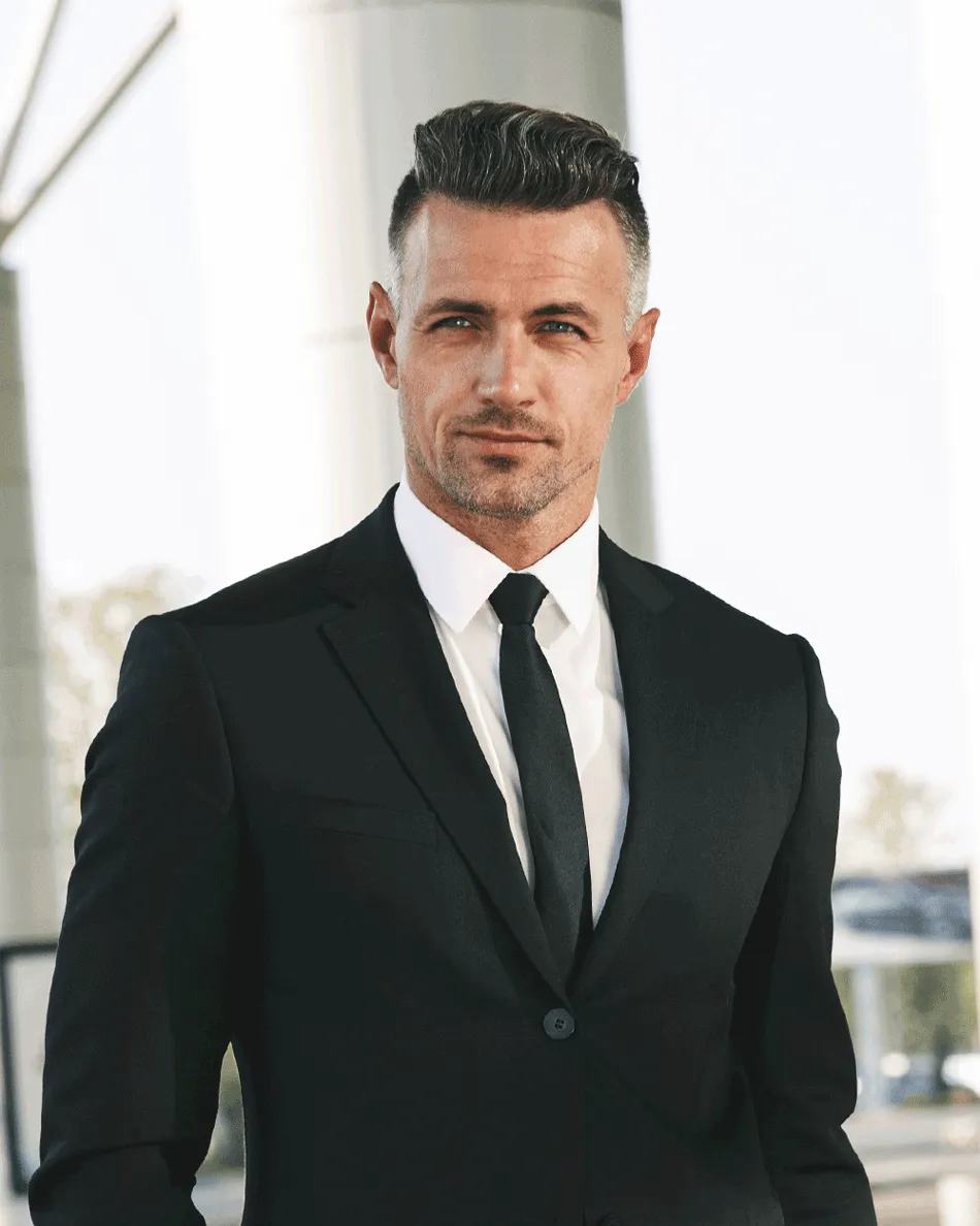 Handsome Businessman Dressed In Suit